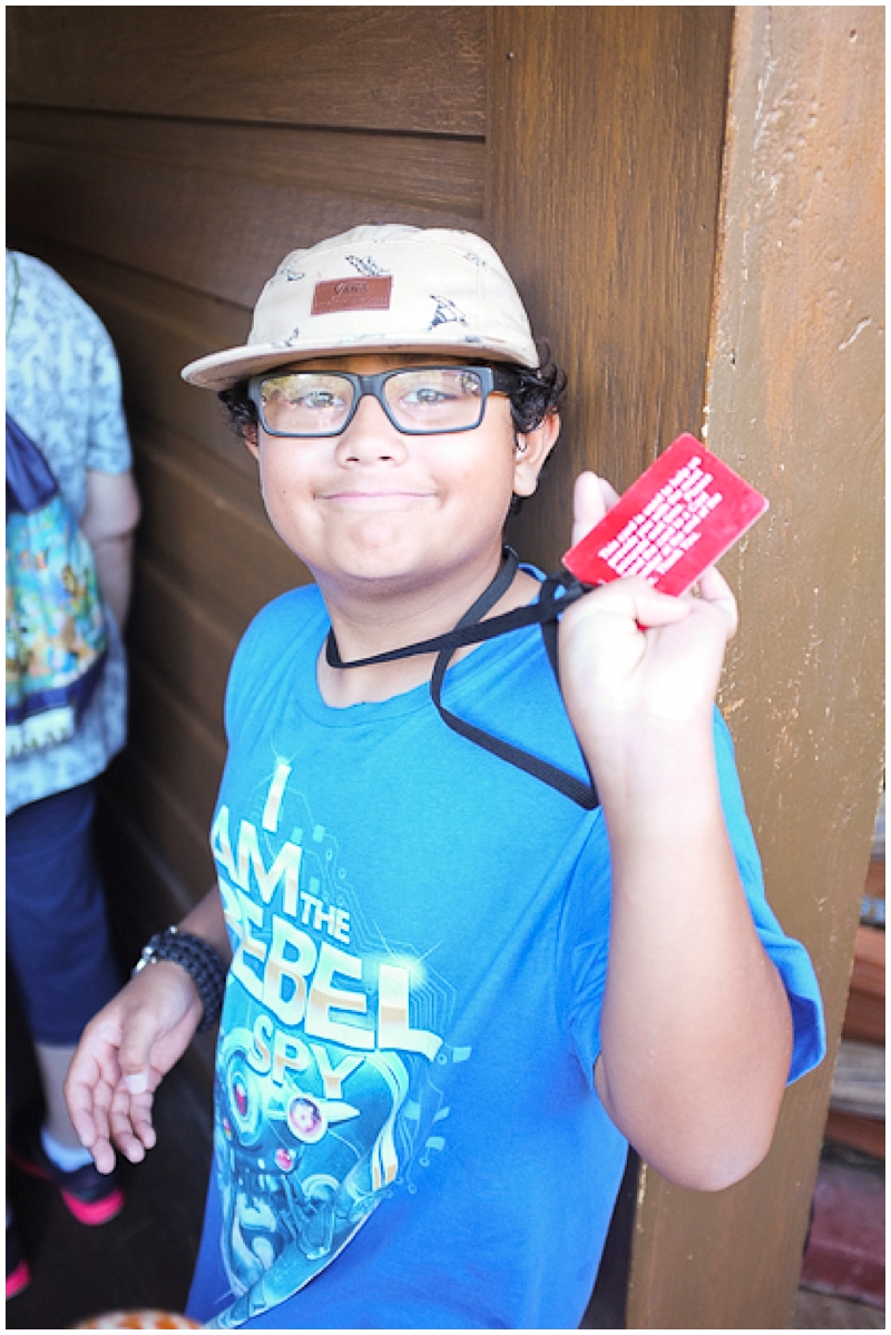   My son, being the inquisitive boy that he is, had been asking how they figured out the wait times for the rides. &nbsp;Jason explained they handed out these red cards to a random person in line. Once they have the card, it starts to count how long the person is waiting until the person gets to the station, hands the card to a cast member for them to put it a machine that then tells them the length of their wait time and then this considered the wait time at the front of the ride. &nbsp;You can imagine how excited he was (he's 10) when he got the red card while waiting in line for the Jungle Cruise Ride. You can also imagine how upset he was when we all realized he forgot to give the card to the cast member before getting on the ride! OOPS...  